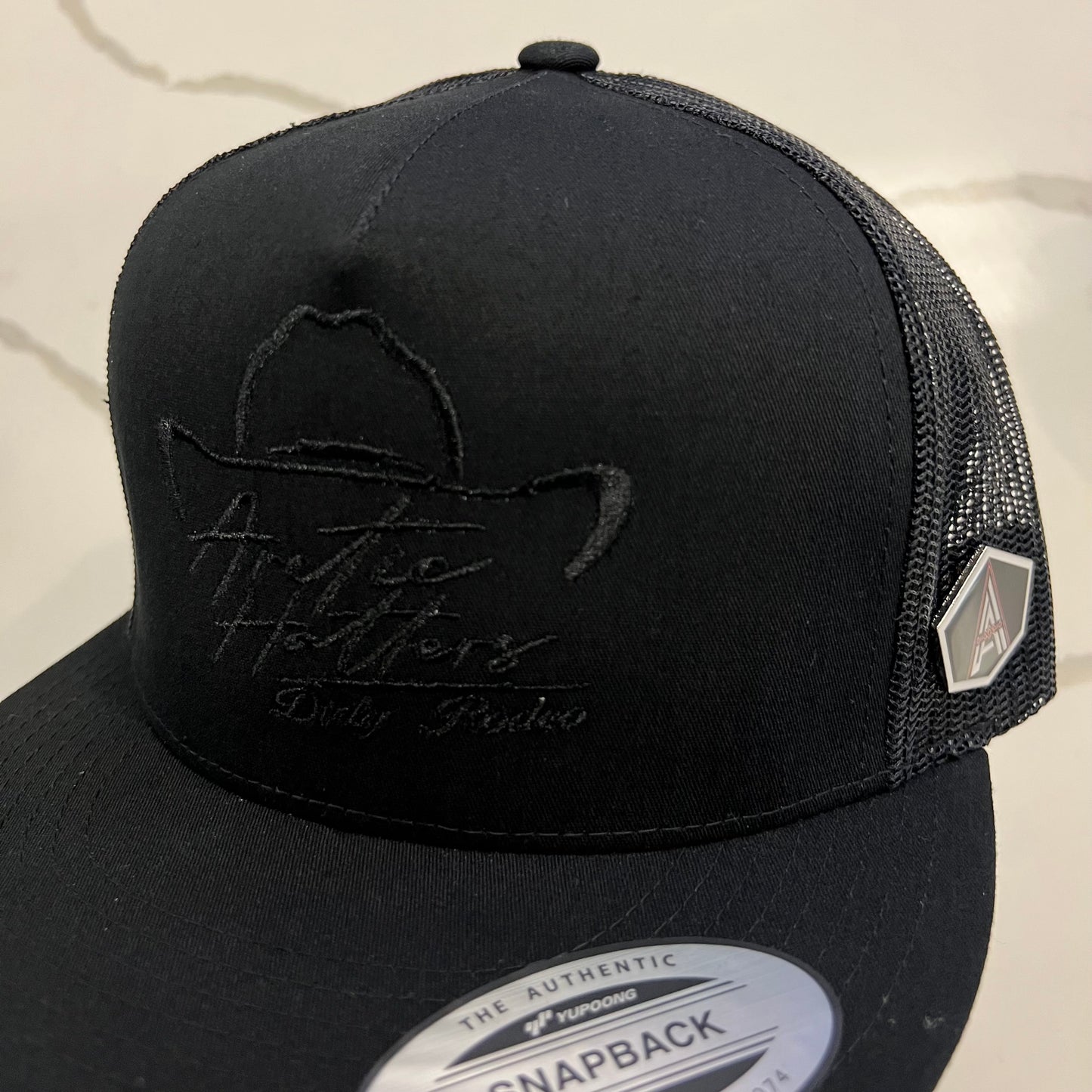 Arctic Hatters Hybrid Black Trucker Hat